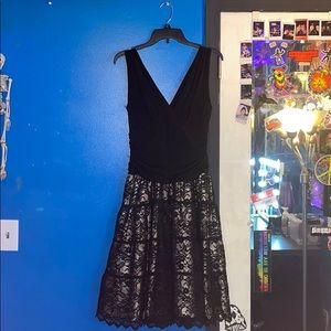 A SLNY black dress, size 10.